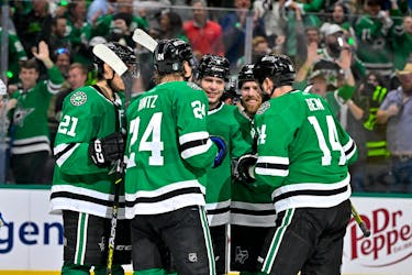 May 9, 2024; Dallas, Texas, USA; Dallas Stars left wing Jason Robertson (21) and center Roope Hintz (24) and defenseman Miro Heiskanen (4) and center Joe Pavelski (16) and left wing Jamie Benn (14) celebrates a power play goal scored by Heiskanen against the Colorado Avalanche during the second period in game two of the second round of the 2024 Stanley Cup Playoffs at American Airlines Center. Mandatory Credit: Jerome Miron-USA TODAY Sports