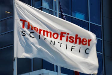 A company flag flies outside the offices of Thermo Fisher Scientific offices in Waltham, Massachusetts, U.S., August 2, 2023.    