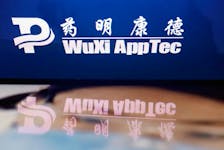 The logo of Chinese drug research and development group WuXi AppTec is displayed alongside its company website, in this illustration picture taken February 5, 2024.