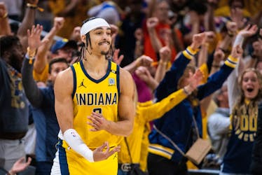 May 10, 2024; Indianapolis, Indiana, USA; Indiana Pacers guard Andrew Nembhard (2) celebrates his game clinching three-point basket during game three of the second round for the 2024 NBA playoffs against the New York Knicks at Gainbridge Fieldhouse. Mandatory Credit: Trevor Ruszkowski-USA TODAY Sports