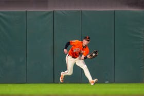 May 10, 2024; San Francisco, California, USA; San Francisco Giants center fielder Tyler Fitzgerald (49) fields a a fly ball against the Cincinnati Reds during the fifth inning at Oracle Park. Mandatory Credit: Neville E. Guard-USA TODAY Sports