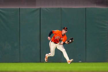 May 10, 2024; San Francisco, California, USA; San Francisco Giants center fielder Tyler Fitzgerald (49) fields a a fly ball against the Cincinnati Reds during the fifth inning at Oracle Park. Mandatory Credit: Neville E. Guard-USA TODAY Sports