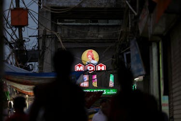 A view of the logo of MDH, an Indian spice manufacturing company, on a shop in the old quarters of Delhi, India, May 3, 2024.