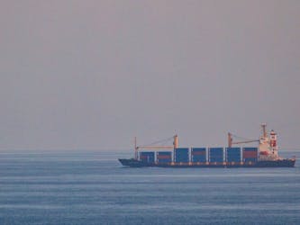 The container ship, Kota Rahmat - with the destination 'VSL NO LINK ISRAEL' - approaches the Bab-el-Mandeb strait on Jan. 18, 2024 in Obock, Djibouti. 