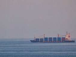 The container ship, Kota Rahmat - with the destination 'VSL NO LINK ISRAEL' - approaches the Bab-el-Mandeb strait on Jan. 18, 2024 in Obock, Djibouti. 