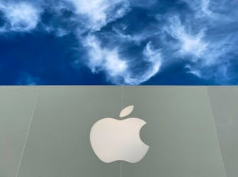 The Apple logo is shown atop an Apple store at a shopping mall in La Jolla, California, U.S., December 17, 2019