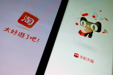 The logo of Alibaba's e-commerce apps Taobao and Tmall are displayed on mobile phones, in this illustration picture taken October 27, 2023.