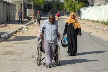 Displaced Palestinians flee Rafah after Israeli forces launched a ground and air operation in the eastern part of the southern Gaza city, amid the ongoing conflict between Israel and Hamas, in Rafah, in the southern Gaza Strip May 12, 2024.