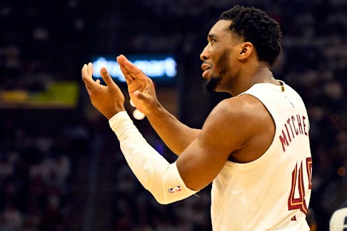 May 11, 2024; Cleveland, Ohio, USA; Cleveland Cavaliers guard Donovan Mitchell (45) celebrates in the second quarter of game three of the second round of the 2024 NBA playoffs against the Boston Celtics at Rocket Mortgage FieldHouse. Mandatory Credit: David Richard-USA TODAY Sports