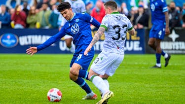 Massimo Ferrin of the Halifax Wanderers is defended by Fraser Aird of Cavalry FC during Canadian Premier League action Saturday afternoon at the Wanderers Grounds. The teams played to a 1-1 draw. - CANADIAN PREMIER LEAGUE