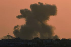 Smoke billows after an explosion in northern Gaza, amid the ongoing conflict between Israel and the Palestinian Islamist group Hamas, as seen from Israel, May 12, 2024.