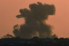 Smoke billows after an explosion in northern Gaza, amid the ongoing conflict between Israel and the Palestinian Islamist group Hamas, as seen from Israel, May 12, 2024.
