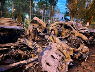A view shows damaged vehicles at the site of a recent military strike, what local authorities called a Ukrainian air attack, in the course of the Russia-Ukraine conflict, in a location given as Belgorod, Russia, in this handout image released on May 11, 2024. Governor of Russia's Belgorod Region Vyacheslav Gladkov via Telegram/Handout via REUTERS ATTENTION EDITORS - THIS IMAGE HAS BEEN SUPPLIED BY A THIRD PARTY. NO RESALES. NO ARCHIVES. MANDATORY CREDIT.