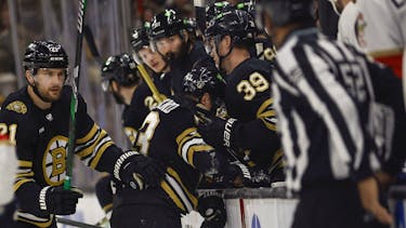 Boston Bruins captain Brad Marchand struggles to get to the bench after being hit during the first period of Game 3 of their Stanley Cup Playoffs second-round series against the Florida Panthers in Boston on Friday night. - Winslow Townson / USA Today Sports