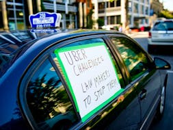 Ottawa cabbies protest Uber outside Ottawa City Hall in this 2015 file photo.