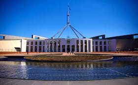 Tourists walk around the forecourt of Australia's Parliament House in Canberra, Australia, October 16, 2017.