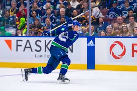 May 8, 2024; Vancouver, British Columbia, CAN; Vancouver Canucks defenseman Nikita Zadorov (91) scores on this shot against the Edmonton Oilers during the third period in game one of the second round of the 2024 Stanley Cup Playoffs at Rogers Arena. Mandatory Credit: Bob Frid-USA TODAY Sports