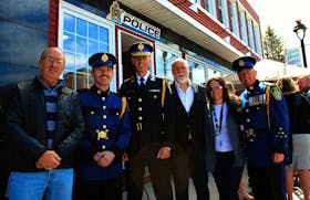 From left, Sydney businessman Craig Boudreau, police Const. James Fitzgerald of downtown patrols, regional police Chief Robert Walsh, CBRM Coun. Eldon MacDonald, Michelle Wilson and Const. Gary Fraser attend Monday's grand opening of the Cape Breton Regional Police Service's Community Office on Charlotte Street in downtown Sydney. "We need a presence in the downtown area," Fraser said. IAN NATHANSON/CAPE BRETON POST