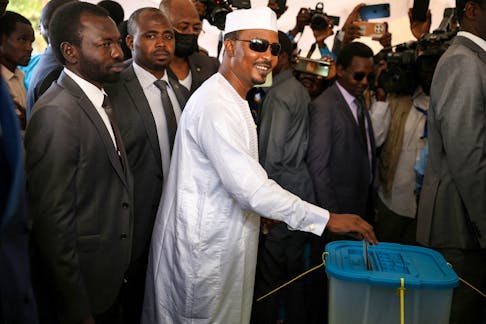 Chadian President Mahamat Idriss Deby casts his vote for the presidential elections in N’Djamena, Chad, May 6, 2024.