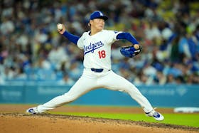 May 7, 2024; Los Angeles, California, USA; Los Angeles Dodgers pitcher Yoshinobu Yamamoto (18) throws in the eighth inning against the Miami Marlins at Dodger Stadium. Mandatory Credit: Kirby Lee-USA TODAY Sports