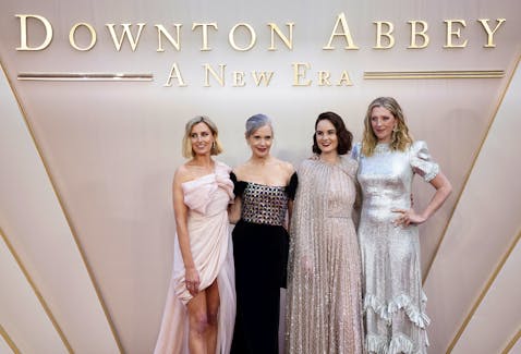 Cast members Laura Carmichael, Elizabeth McGovern, Michelle Dockery and costume designer Anna Robbins arrive for the world premiere of 'Downton Abbey: A New Era' in London, Britain, April 25, 2022.