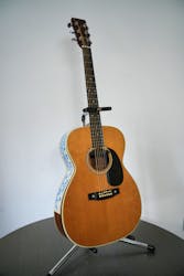 Musician Eric Clapton's 1974 000-28 Martin acoustic guitar, on which he wrote the song "Wonderful Tonight" is displayed at Bonhams auction house, ahead of "Rock, Pop & Film" auction on June 12, in London, Britain May 13, 2024.