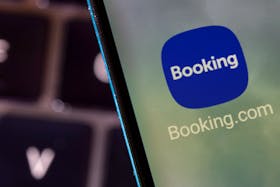 Booking.com app is seen on a smartphone in this illustration taken February 27, 2022.