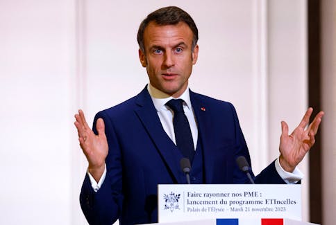 French President Emmanuel Macron gestures as he delivers a speech during a meeting with heads of Small and Medium Enterprises (PME), members of professional federations and local elected officials to launch of the new ETIncelles program to win the export battle, at the Elysee Palace in Paris, France, November 21, 2023.