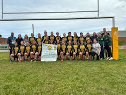 The host Three Oaks Axewomen won the girls’ championship banner at the 28th David Voye Memorial rugby tournament in Summerside on May 11. Members of the Axewomen are, front row, from left: Jaida Clow, Peyton Maund, Katie-Grace Noye, Kailyn Gallant, Ava Pomeroy, Nina Kenny, Sophie McKenna, Marleigh-Jane Smallwood, Alexa McCarthy, Anna Gallant, Hudsyn Somers, Tayler Warren, Madison Brown and Bella MacKinnon. Back row: Brent Woodside, Bree McAlduff, Ava Allain, Deirdre Studer, Nya Martin, Brooke McGuigan, Tori Atkinson, Carley Blanchard, Kenna Warnell, Chloe Campbell, Finley Blacquiere, Emma Cerisano, Kennedy Clow, Kaycee Rennie, Dru Gillis, Elly Smallwood and Tim Hockin. Photo Courtesy of Joel Arsenault • Special to The Guardian