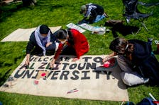 Students make a banner that will name their encampment, 'El Zatoun University',  in support of Palesitinians that has been set up by students in the courtyard in Studley Campus at Dalhousie University Monday May 13, 20124. El Zatoun means olive.

TIM KROCHAK PHOTO