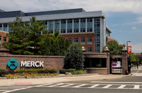 The Merck logo is seen at a gate to the Merck & Co campus in Rahway, New Jersey, U.S., July 12, 2018.