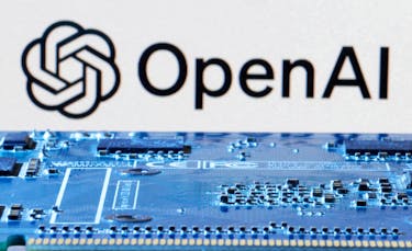 OpenAI logo is seen near computer motherboard in this illustration taken January 8, 2024.