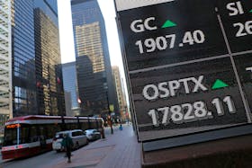 A screen shows a price of Canada's main stock index, the Toronto Stock Exchange's S&P/TSX composite index, as it rose to a record high in Toronto, Ontario, Canada January 7, 2021. 
