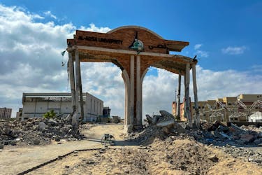 A damaged gate of Al-Aqsa university, which was destroyed during Israel's military offensive, stands in Khan Younis in the southern Gaza Strip April 14, 2024.