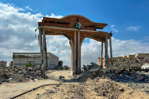 A damaged gate of Al-Aqsa university, which was destroyed during Israel's military offensive, stands in Khan Younis in the southern Gaza Strip April 14, 2024.