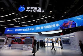 People stand at the booth of Ant Group at the China International Fair for Trade in Services (CIFTIS) in Beijing, China September 2, 2023.
