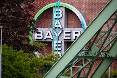 The logo of Bayer AG is pictured outside a plant of the German pharmaceutical and chemical maker in Wuppertal, Germany August 9, 2019.