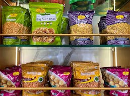 A view shows packets of snacks on the shelves inside a Haldiram's restaurant in Mumbai, India, September 6, 2023.