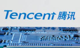 Tencent logo is seen near computer motherboard in this illustration taken January 8, 2024.