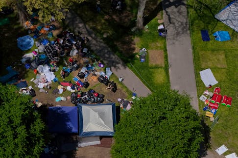 A drone view shows pro-Palestinian protestors voluntarily packing up their encampment on the Yard at Harvard University, during the ongoing conflict between Israel and the Palestinian Islamist group Hamas, in Cambridge, Massachusetts, U.S., May 14, 2024. 