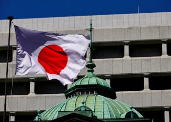The Japanese national flag waves at the Bank of Japan building in Tokyo, Japan March 18, 2024.