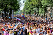 People celebrate during the annual Rainbow Parade, a Pride parade to support the rights of lesbian, gay, bisexual, transgender, intersex and queer (LGBTIQ) people in Vienna, Austria June 11, 2022.