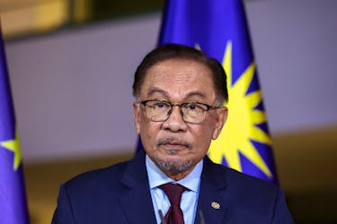 Malaysia's Prime Minister Anwar Ibrahim holds a press conference with German Chancellor Olaf Scholz (not pictured) in Berlin, Germany, March 11, 2024.