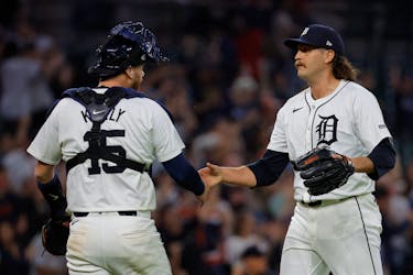 May 13, 2024; Detroit, Michigan, USA;  Detroit Tigers catcher Carson Kelly (15) and  pitcher Jason Foley (68) celebrate after defeating the Miami Marlins at Comerica Park. Mandatory Credit: Rick Osentoski-USA TODAY Sports