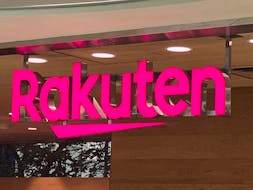 A view of the logo of Rakuten Mobile at its branch in Tokyo, Japan, November 28, 2023.
