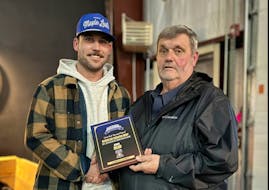 Clarenville Ford Caribous’ forward Kevin Reid, left, was named the Kevin Butt Memorial Award as the Avalon East Senior Hockey League’s regular season MVP during the league’s award ceremony last weekend. With Reid is Caribous GM and league vice-president Ivan Hapgood. Contributed photo