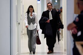 British actress Charlotte Lewis and her lawyer Benjamin Chouai arrive for the verdict of her defamation case against filmmaker Roman Polanski, at the courthouse in Paris, France, May 14, 2024.