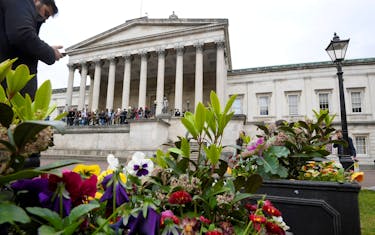 Students and visitors are seen walking around the main campus buildings of University College London (UCL), part of the University of London, Britain, April 24, 2017.
