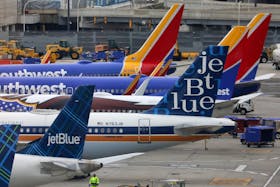 JetBlue and Southwest Airlines planes are parked at the LaGuardia Airport in New York City, U.S. March 4, 2023. 