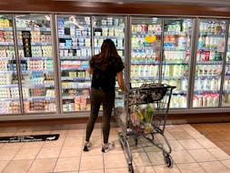 A woman shops in a supermarket in Los Angeles, California, U.S., June 13, 2022.